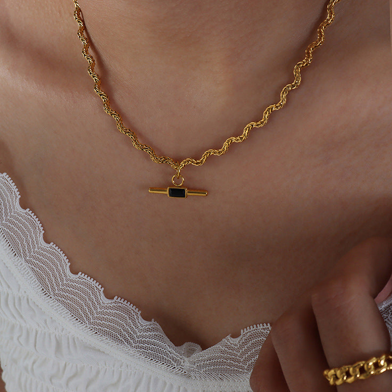 Ariadne Gold with Black Bar Design