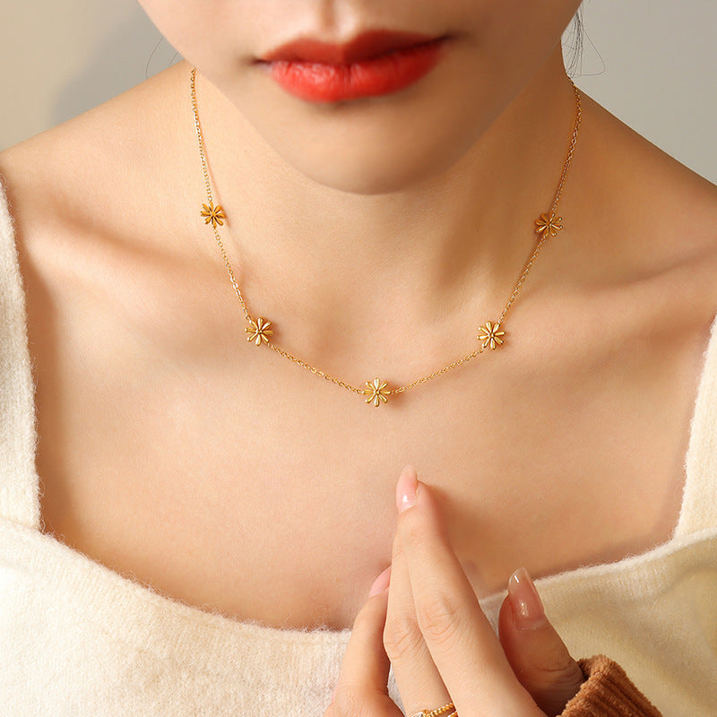 Amelia Gold Flower Pattern Necklace on model